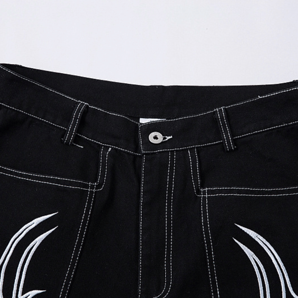 Baggy Embroidered Jeans with White Tribal Symbol Design