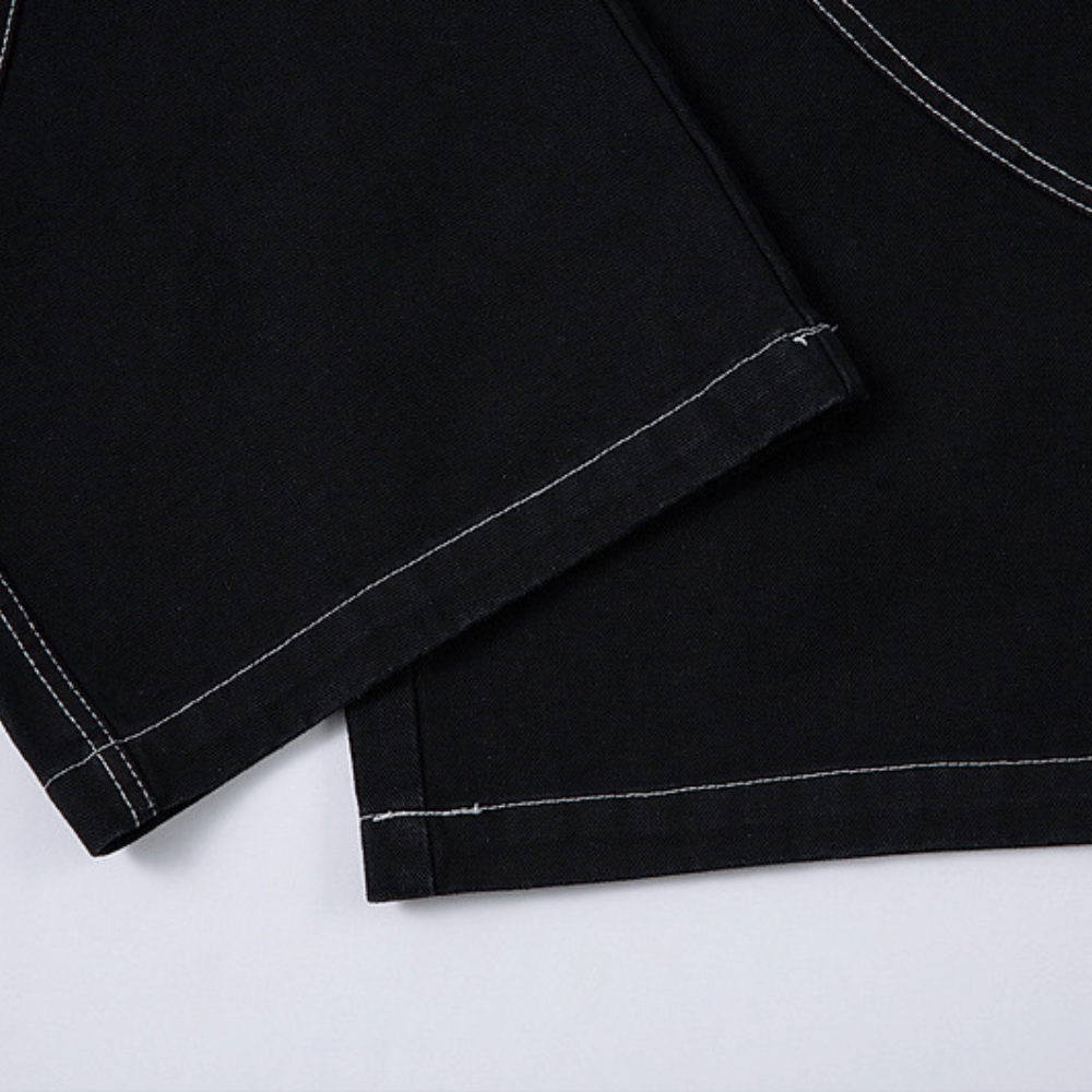Baggy Embroidered Jeans with White Tribal Symbol Design
