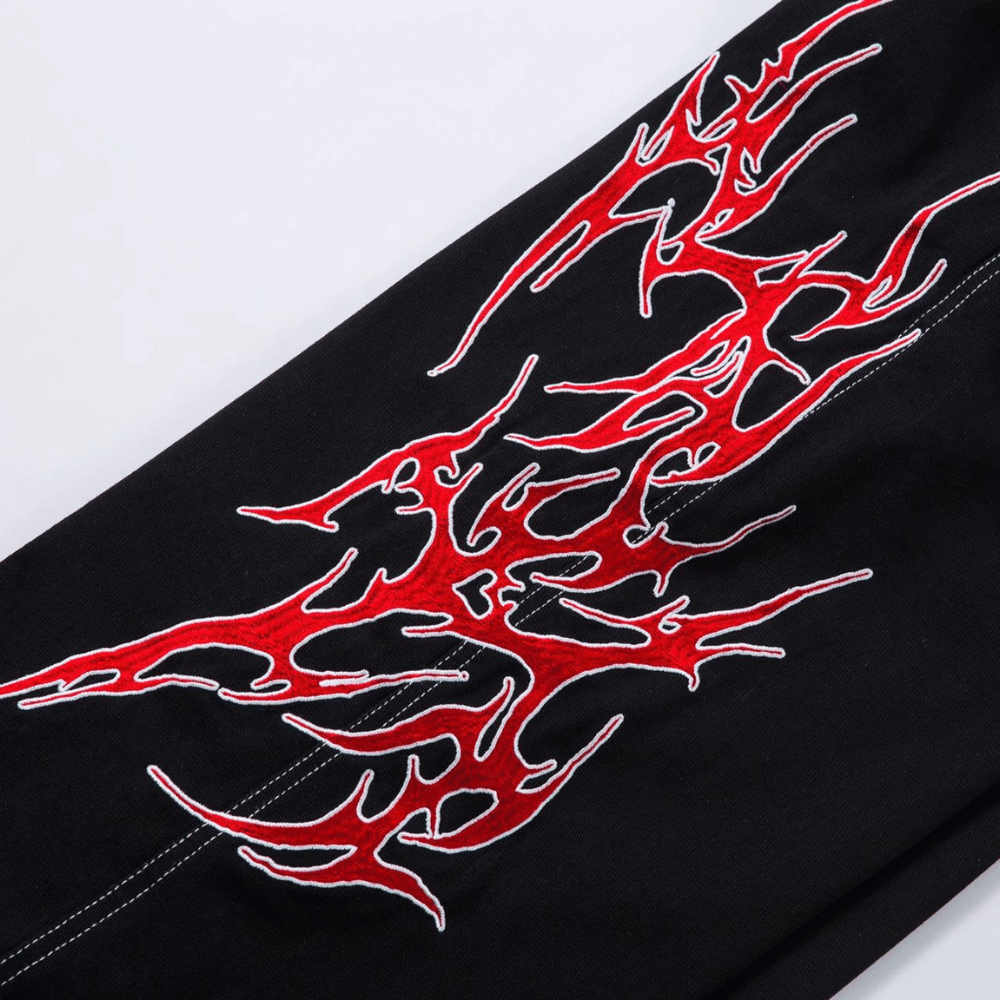 Embroidered Jeans with Tribal Flame Design