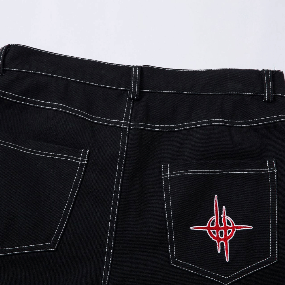 Embroidered Jeans with Tribal Flame Design