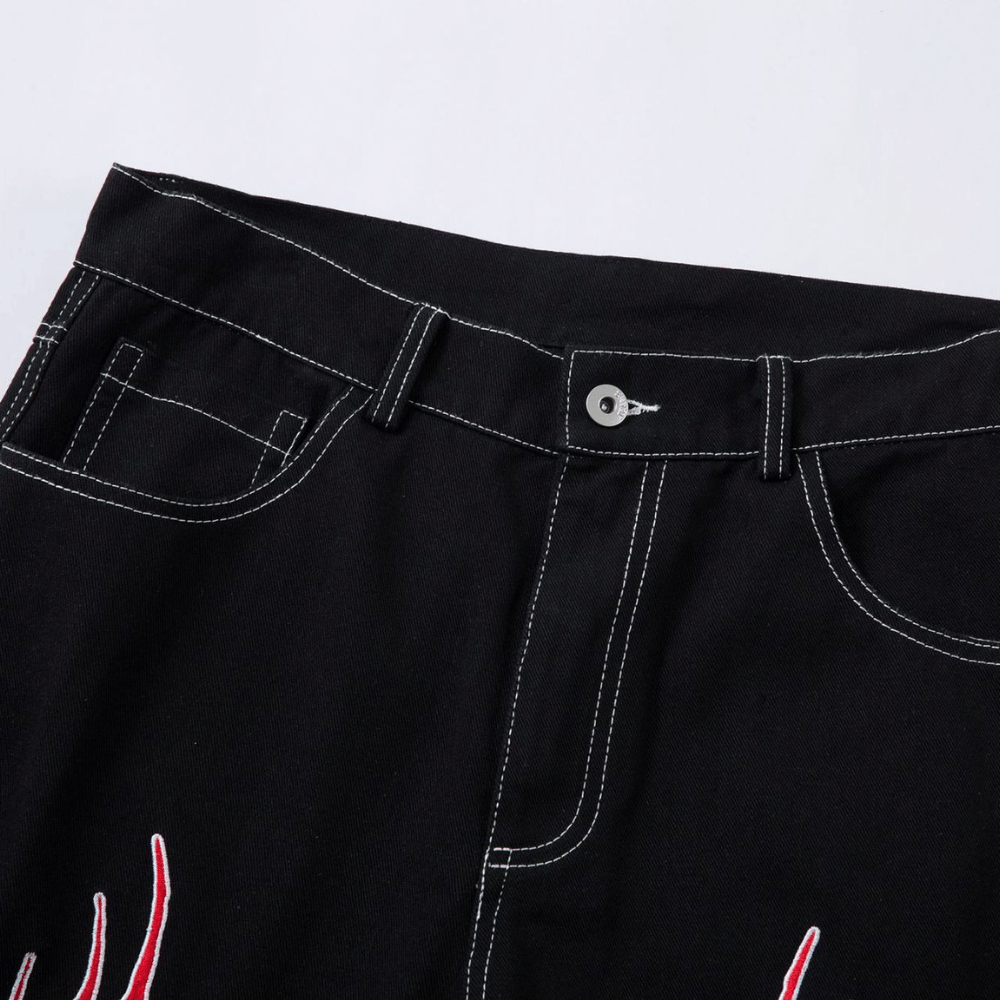 Embroidered Jeans with Tribal Flame Design