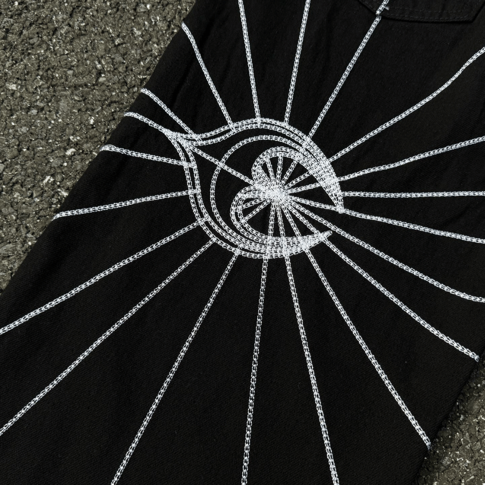 Y2K Embroidered Baggy Jeans with White Starburst Pattern