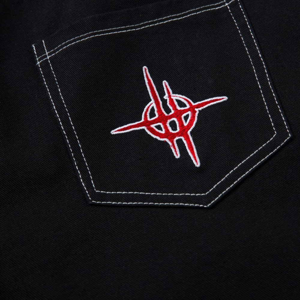 Embroidered Jeans with Tribal Flame Design