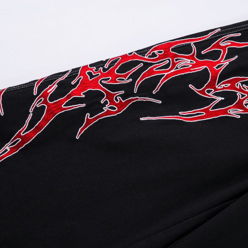 Embroidered Jeans with Tribal Flame Design