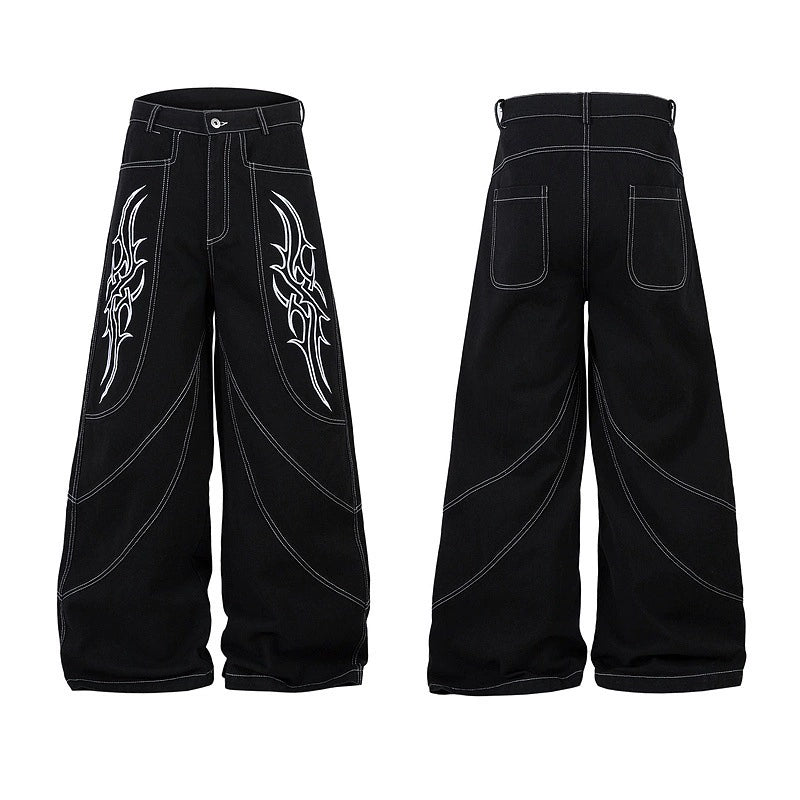 Baggy Embroidered Jeans with White Tribal Symbol Design